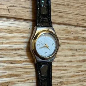 Swatch  Swiss Irony Lady Reverence Black band and Gold  Rim Classic Timepiece LB170E - LADY BLACK SINGLE - Swatch® United States main image 4